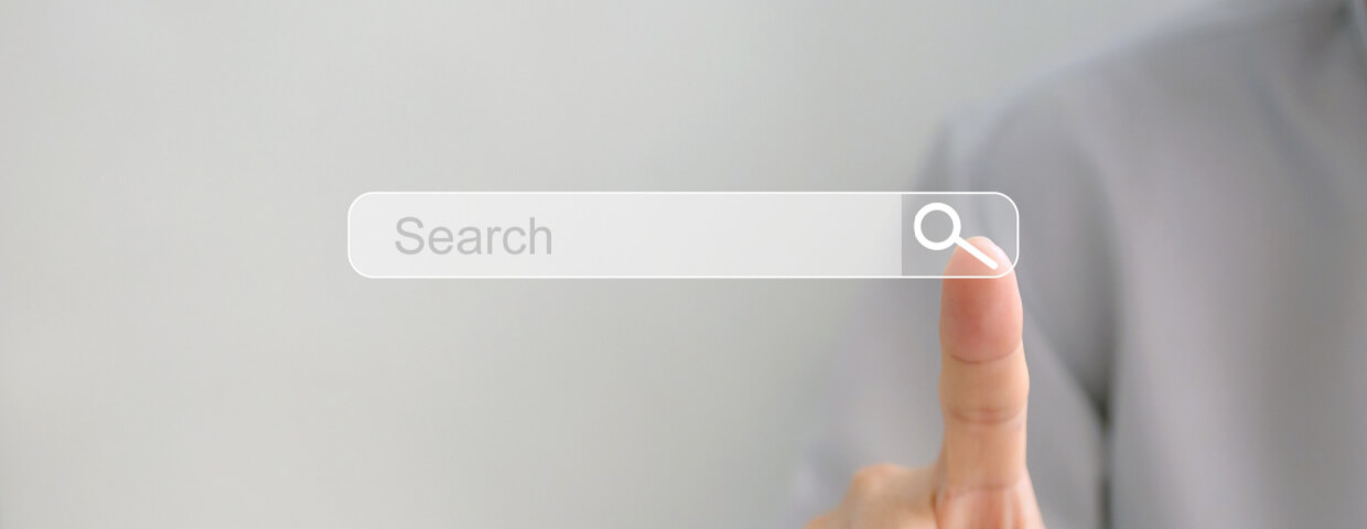 finger touching search bar